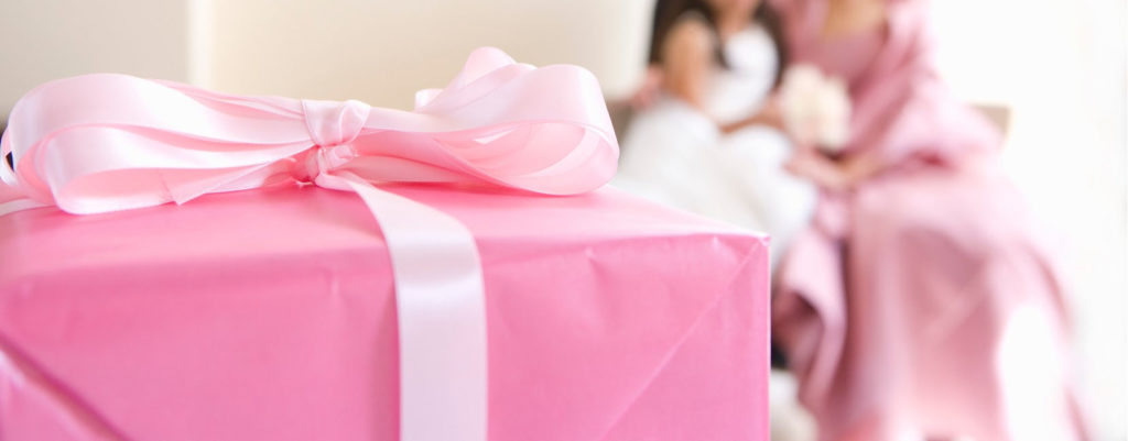Pink gift box with satin pink bow.