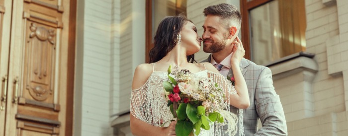 A bride and groom on a wedding photoshoot.