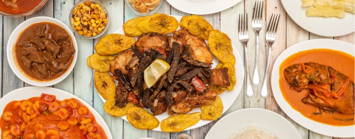 A table full of Dominican foods.