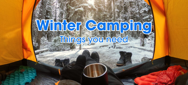 Winter camping scene in the snowed mountain top.