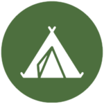 Green icon illustrating a tent
