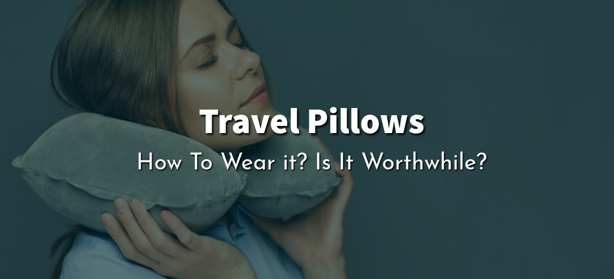 A woman wearing a travel pillow and taking a nap.