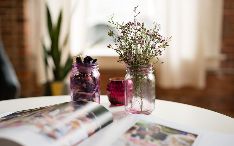 Tint mason jars displayed on a coffee table