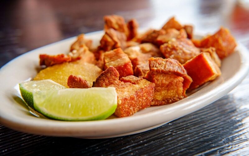 Dominican food called chicharrones.