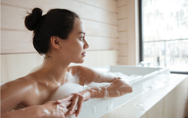 A woman in a bath tub