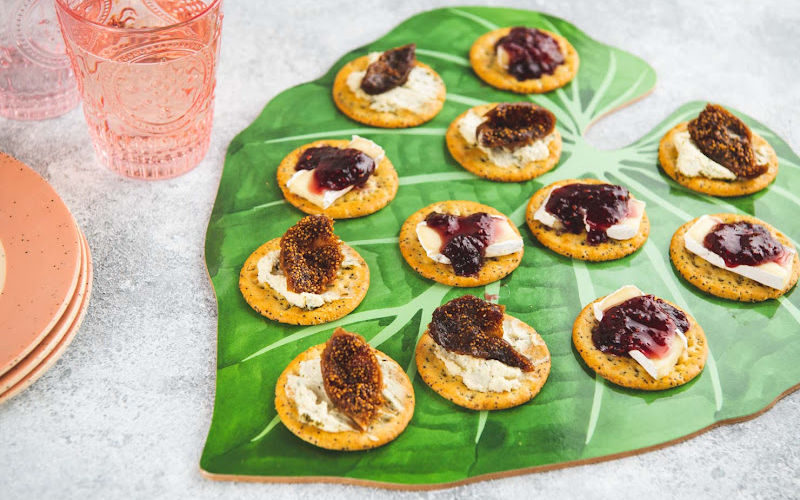 Small finger food placed on a large green leaf