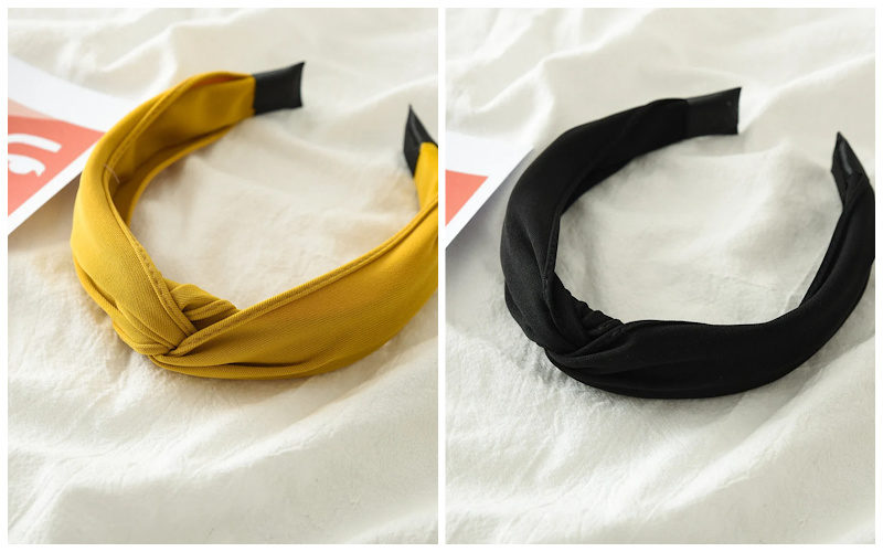 Yellow and black solid color headbands.